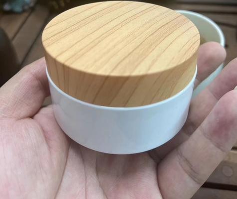 化粧品OEMのためのプラスチック木製の穀物カバー100ml 200mlクリームの瓶のタケ